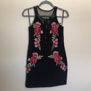 Black dress with embroidered flowers